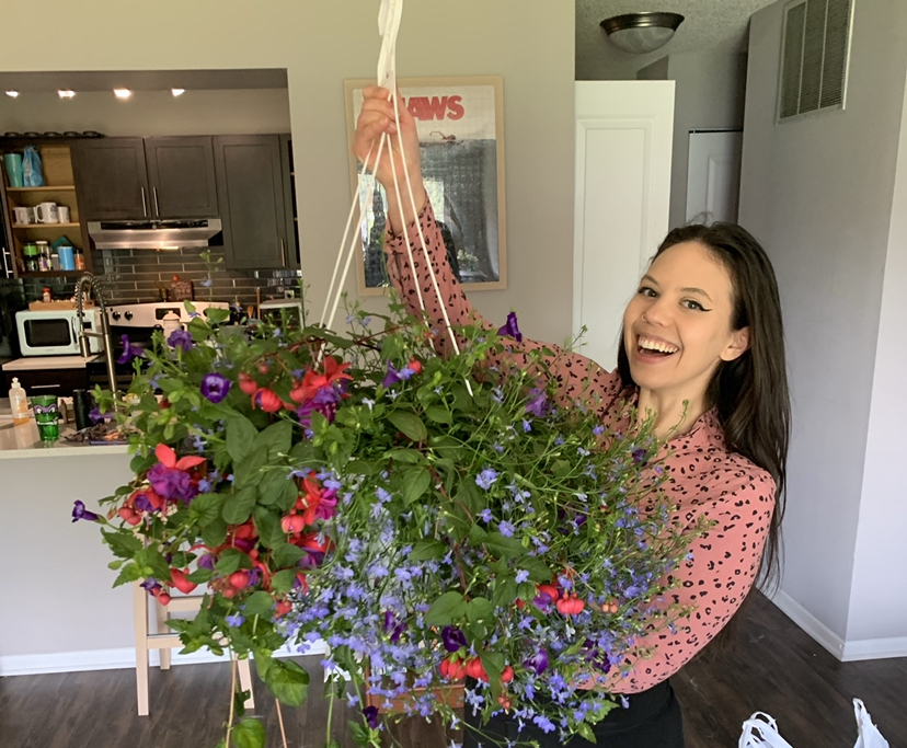 Buying a hanging plant with native flowers is a great way to attract hummingbirds. 