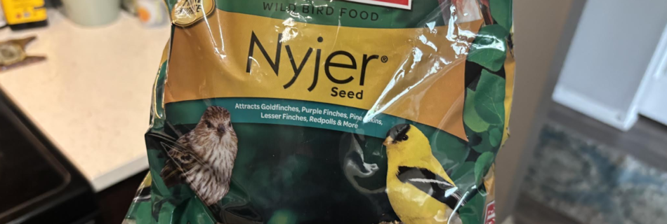 A bag of Kaytee Nyjer bird seed.