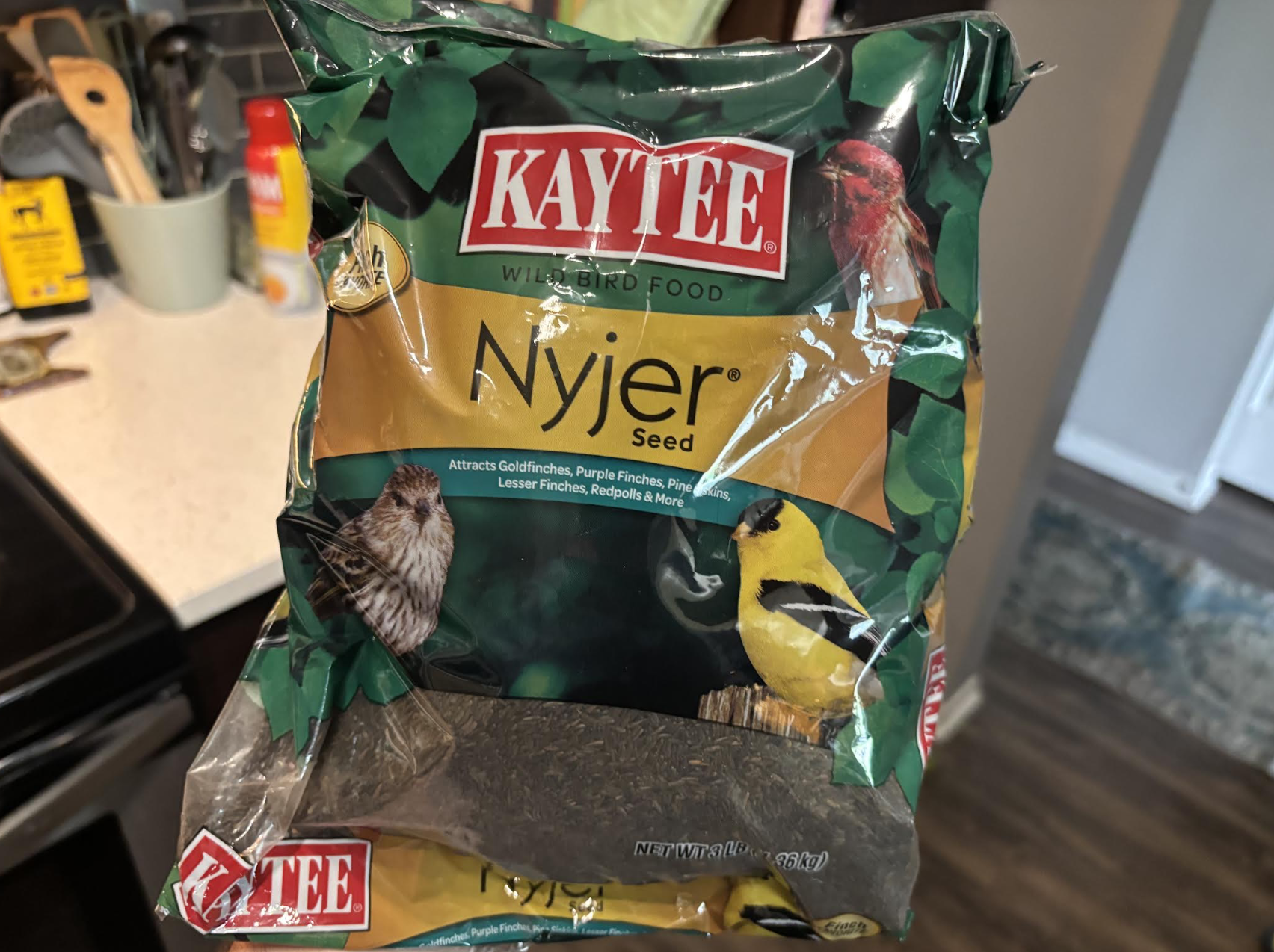 A bag of Kaytee Nyjer bird seed.